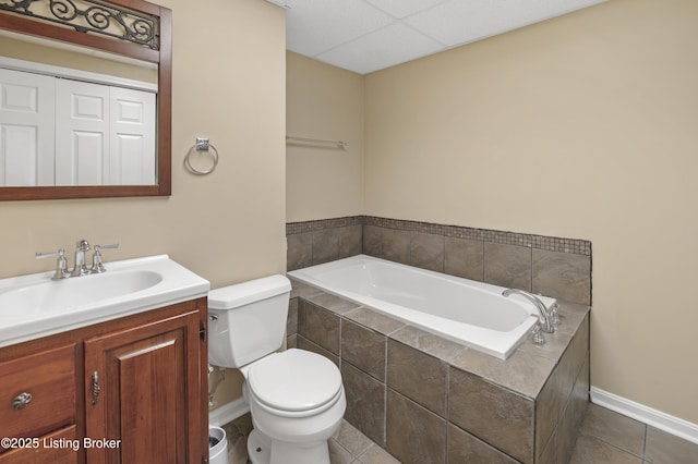 12308 Dominion Way, Louisville, KY 40299 - full bath featuring toilet, a bath, tile patterned flooring, vanity, and baseboards