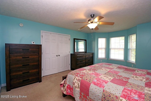 42 Rolling Ridge Ct, Brandenburg, KY 40108 - bedroom with carpet flooring, a closet, ceiling fan, and a textured ceiling