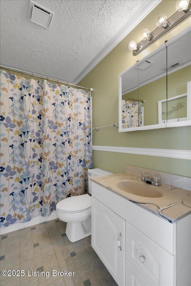 8400 Wisertown Rd, Louisville, KY 40214 - full bathroom featuring a textured ceiling, vanity, toilet, ornamental molding, and a shower with curtain