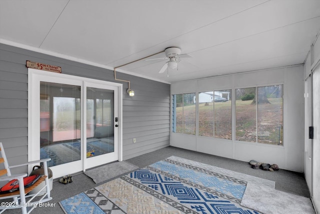 8400 Wisertown Rd, Louisville, KY 40214 - unfurnished sunroom featuring ceiling fan