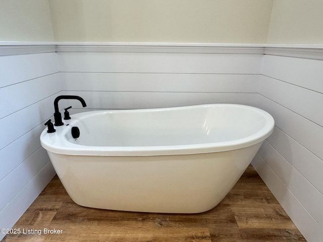 57 Malvern Ct, Brandenburg, KY 40108 - bathroom featuring wood finished floors and a soaking tub