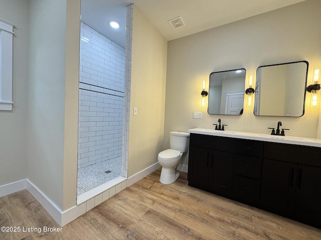 57 Malvern Ct, Brandenburg, KY 40108 - full bath featuring double vanity, a tile shower, wood finished floors, and recessed lighting