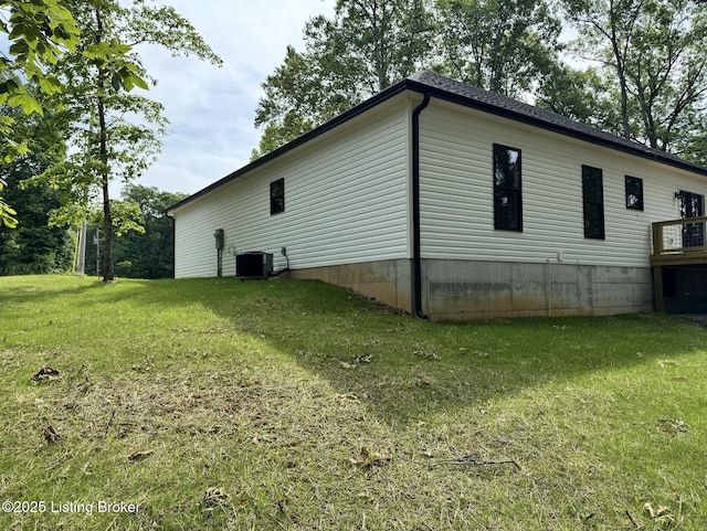 57 Malvern Ct, Brandenburg, KY 40108 - view of side of property featuring a central AC unit and a yard