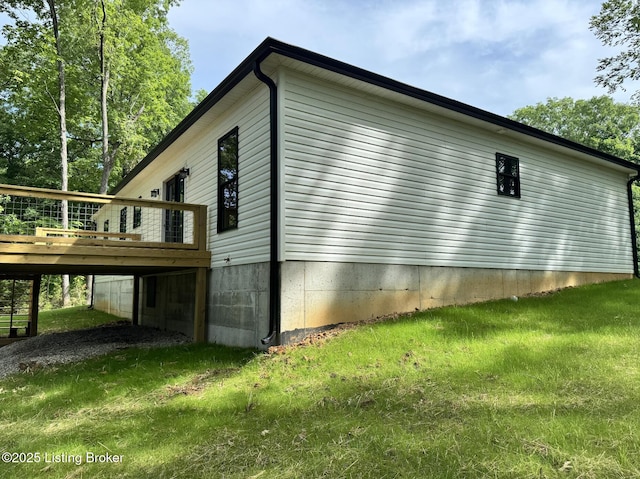 57 Malvern Ct, Brandenburg, KY 40108 - view of side of property with a deck and a yard