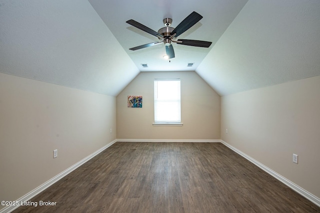 58 Sissy Ct, Elizabethtown, KY 42701 - additional living space featuring dark wood-type flooring, vaulted ceiling, baseboards, and ceiling fan
