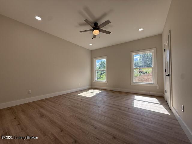 49 Roy Rd, Eastview, KY 42732 - spare room featuring a ceiling fan, wood finished floors, baseboards, and recessed lighting