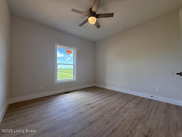 49 Roy Rd, Eastview, KY 42732 - unfurnished room featuring wood finished floors, baseboards, and ceiling fan