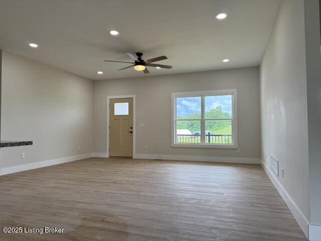 49 Roy Rd, Eastview, KY 42732 - foyer featuring wood finished floors, recessed lighting, ceiling fan, and baseboards