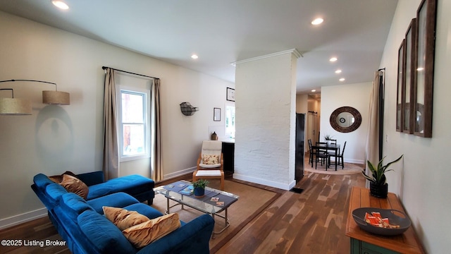 621 E Kentucky St, Louisville, KY 40203 - living area featuring wood finished floors, recessed lighting, and baseboards