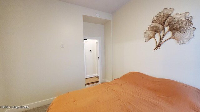 621 E Kentucky St, Louisville, KY 40203 - carpeted bedroom with baseboards