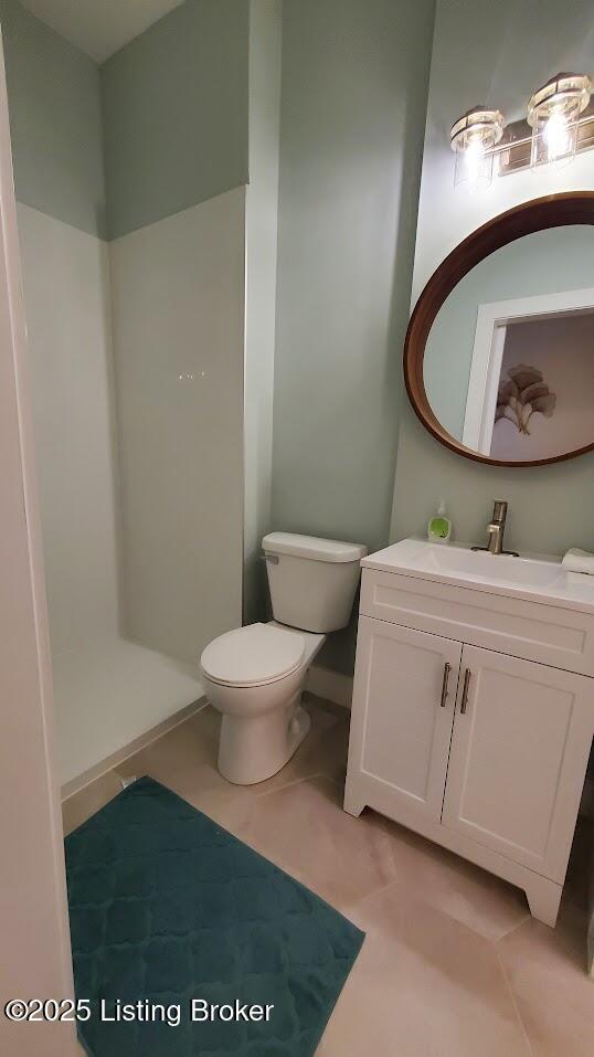 621 E Kentucky St, Louisville, KY 40203 - bathroom with vanity and toilet