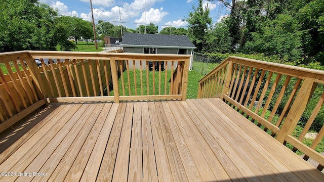 621 E Kentucky St, Louisville, KY 40203 - deck featuring an outbuilding and a lawn