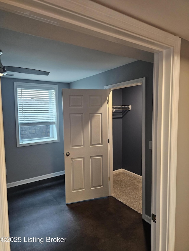11307 Wind Haven Way, Louisville, KY 40291 - unfurnished bedroom with a walk in closet, baseboards, and a closet