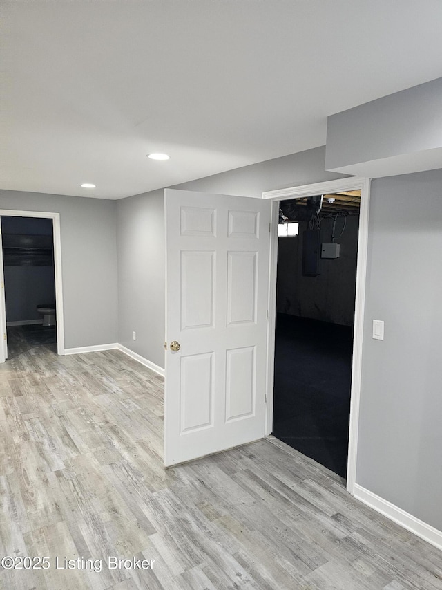 11307 Wind Haven Way, Louisville, KY 40291 - finished basement featuring light wood-style floors, baseboards, recessed lighting, and electric panel