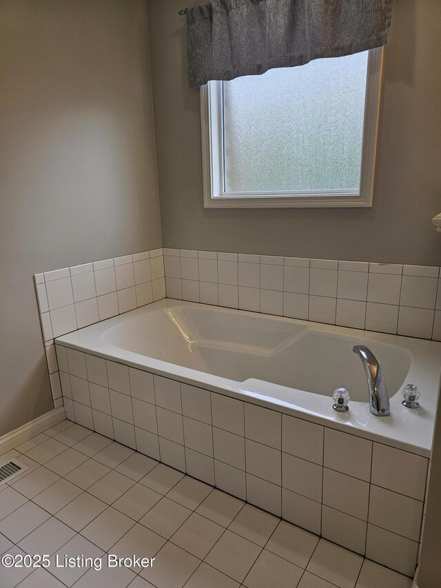 11307 Wind Haven Way, Louisville, KY 40291 - bathroom with tile patterned floors and a garden tub