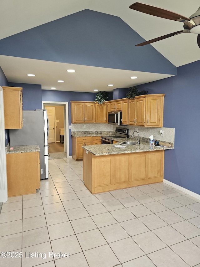11307 Wind Haven Way, Louisville, KY 40291 - kitchen with appliances with stainless steel finishes, a peninsula, a sink, decorative backsplash, and lofted ceiling