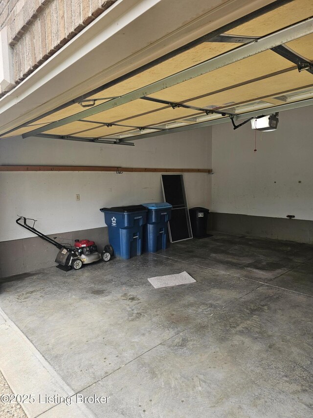 11307 Wind Haven Way, Louisville, KY 40291 - garage featuring a garage door opener