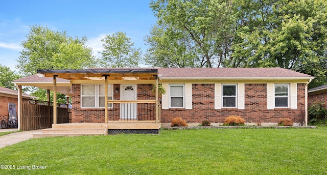 265 N Steedland Dr, Shepherdsville, KY 40229 - view of front of home with a front lawn, brick siding, covered porch, and a shingled roof