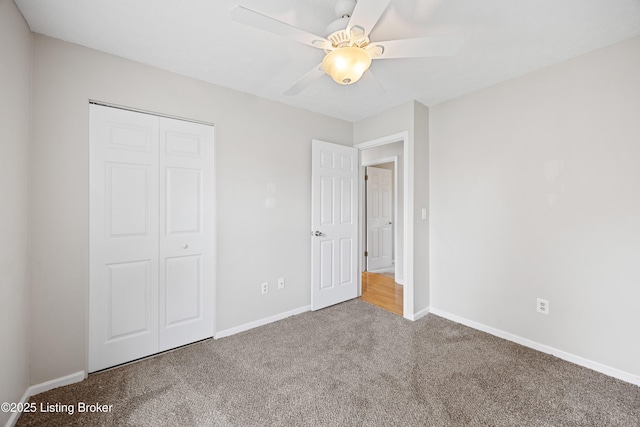 265 N Steedland Dr, Shepherdsville, KY 40229 - unfurnished bedroom featuring carpet floors, a closet, baseboards, and a ceiling fan