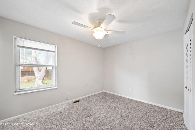 265 N Steedland Dr, Shepherdsville, KY 40229 - unfurnished bedroom with multiple windows, carpet, baseboards, and a closet