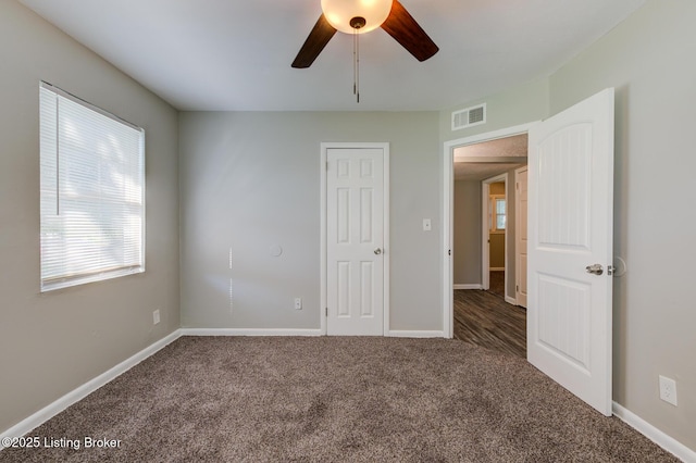 13500 Greystone Ave, Louisville, KY 40272 - unfurnished bedroom with carpet floors and ceiling fan