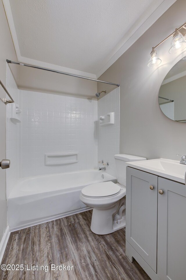 13500 Greystone Ave, Louisville, KY 40272 - full bathroom with vanity, wood finished floors, shower / bathtub combination, a textured ceiling, and ornamental molding