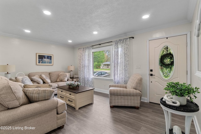 4328 Dohn Ave, Louisville, KY 40216 - living area with wood finished floors, recessed lighting, ornamental molding, and baseboards