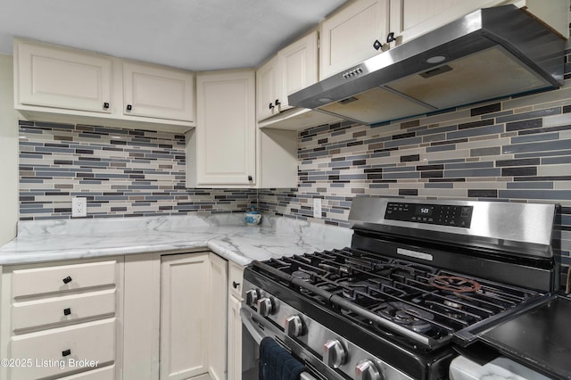 4328 Dohn Ave, Louisville, KY 40216 - kitchen featuring stainless steel gas stove, exhaust hood, backsplash, and light stone countertops