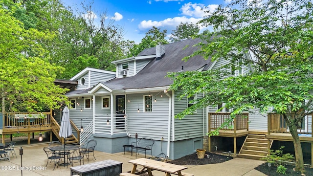 11805 Cedardale Rd, Anchorage, KY 40223 - rear view of property featuring stairway, a wooden deck, roof with shingles, and a patio area