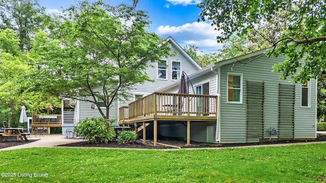 11805 Cedardale Rd, Anchorage, KY 40223 - rear view of house featuring a deck, a yard, and a patio area