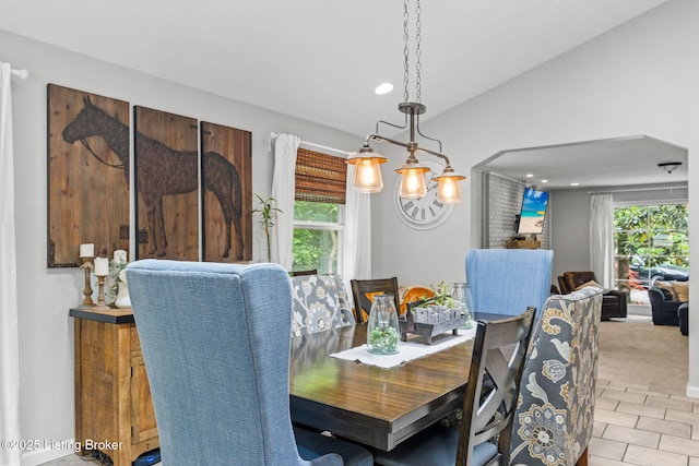 11805 Cedardale Rd, Anchorage, KY 40223 - dining room featuring plenty of natural light, light tile patterned floors, recessed lighting, vaulted ceiling, and light colored carpet
