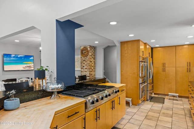 11805 Cedardale Rd, Anchorage, KY 40223 - kitchen featuring butcher block counters, recessed lighting, stainless steel appliances, and light tile patterned floors