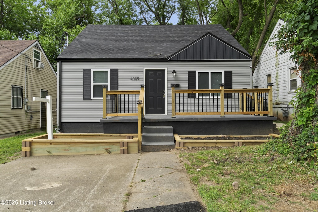 4309 Virginia Ave, Louisville, KY 40211 - view of front of home with a shingled roof