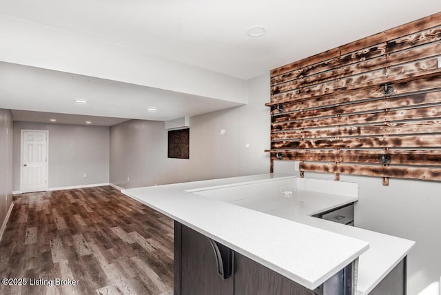 9006 Big Boulder Dr, Louisville, KY 40291 - kitchen featuring dark wood finished floors, light countertops, recessed lighting, baseboards, and a peninsula