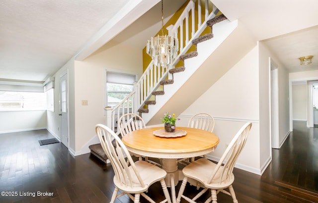1031 Thruston Ave, Louisville, KY 40217 - dining room featuring stairway, hardwood / wood-style flooring, and baseboards