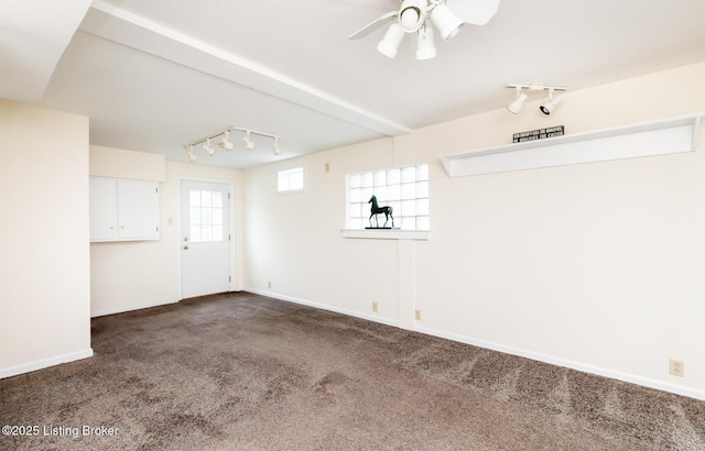 1031 Thruston Ave, Louisville, KY 40217 - carpeted spare room featuring rail lighting, a ceiling fan, and baseboards
