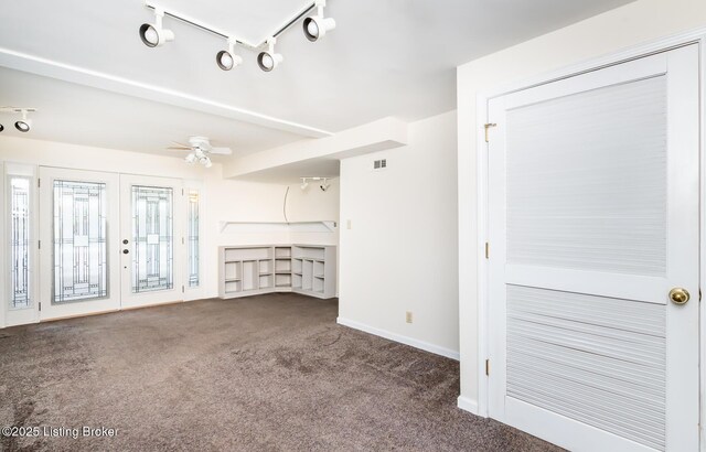 1031 Thruston Ave, Louisville, KY 40217 - unfurnished living room featuring carpet, ceiling fan, and baseboards