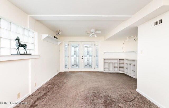 1031 Thruston Ave, Louisville, KY 40217 - unfurnished living room featuring carpet, ceiling fan, and baseboards