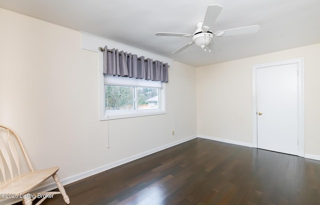 1031 Thruston Ave, Louisville, KY 40217 - unfurnished bedroom featuring dark wood-style floors, baseboards, and a ceiling fan