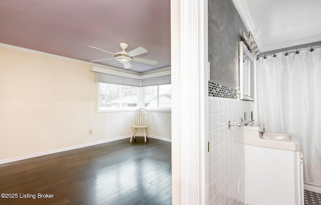 1031 Thruston Ave, Louisville, KY 40217 - bathroom with ornamental molding, ceiling fan, wood finished floors, and baseboards