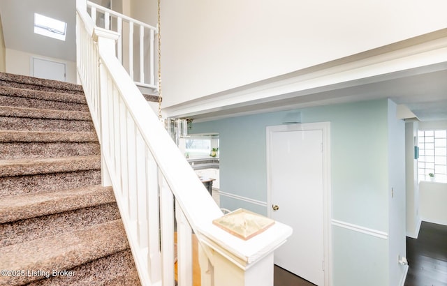 1031 Thruston Ave, Louisville, KY 40217 - stairway featuring baseboards