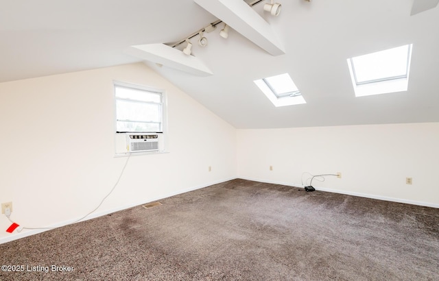 1031 Thruston Ave, Louisville, KY 40217 - bonus room with a skylight, carpet, vaulted ceiling, baseboards, and cooling unit