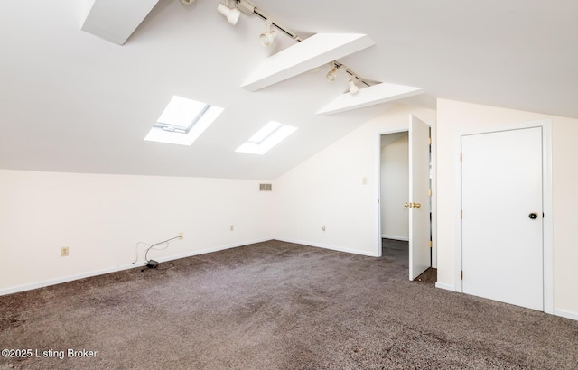1031 Thruston Ave, Louisville, KY 40217 - bonus room with a skylight, lofted ceiling, carpet, and baseboards