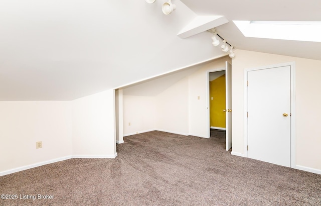 1031 Thruston Ave, Louisville, KY 40217 - additional living space with vaulted ceiling, carpet flooring, a skylight, and baseboards