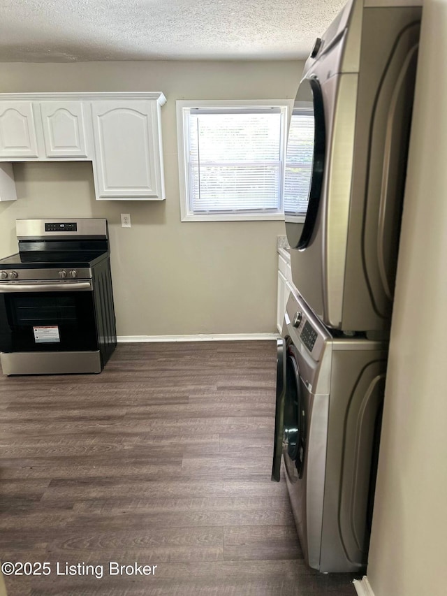 322 Mac Brae Rd, Louisville, KY 40214 - washroom with stacked washer / dryer, dark wood-style flooring, a textured ceiling, and baseboards