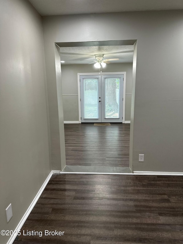 322 Mac Brae Rd, Louisville, KY 40214 - spare room featuring french doors, wood finished floors, baseboards, and ceiling fan