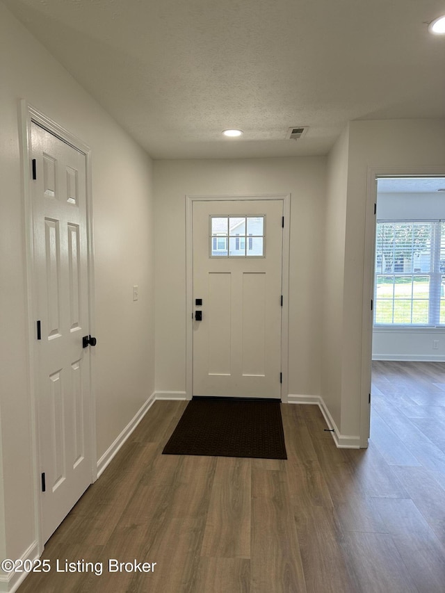 1129 Willow Oak Ln, La Grange, KY 40031 - entrance foyer featuring baseboards, dark wood-style floors, and recessed lighting