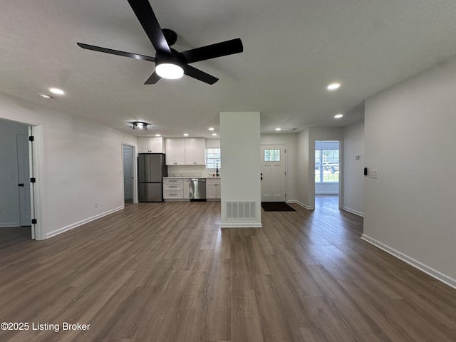 1129 Willow Oak Ln, La Grange, KY 40031 - unfurnished living room featuring a ceiling fan, dark wood finished floors, baseboards, and recessed lighting