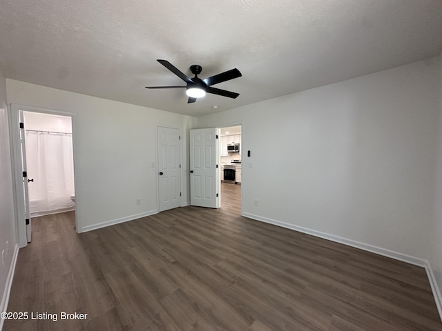 1129 Willow Oak Ln, La Grange, KY 40031 - unfurnished bedroom with baseboards and dark wood finished floors