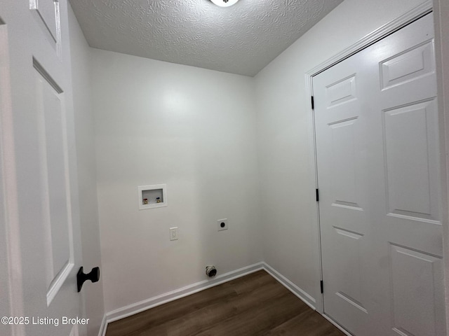 1129 Willow Oak Ln, La Grange, KY 40031 - laundry room featuring electric dryer hookup, dark wood-style floors, washer hookup, a textured ceiling, and baseboards